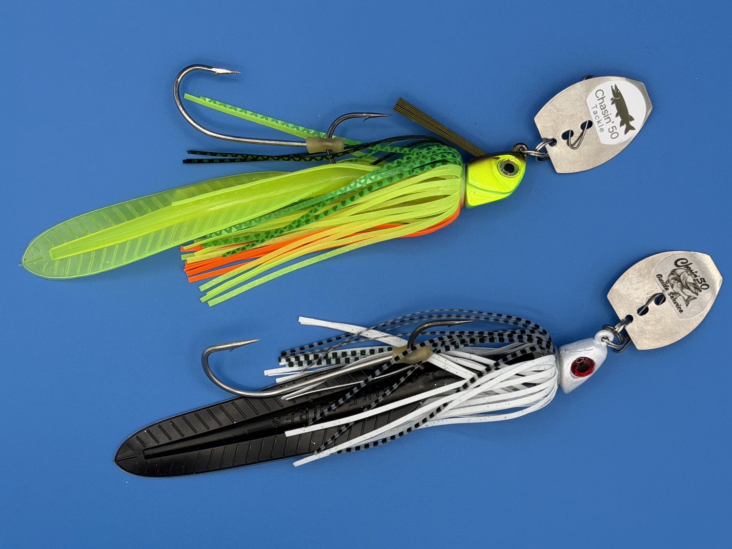 Two Chasin'50 Sonic Shaker vibration blade baits with branded blades and reaper trailers